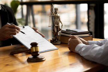 The lawyer explains the contract before allowing the client to sign the lawsuit admitting that the...