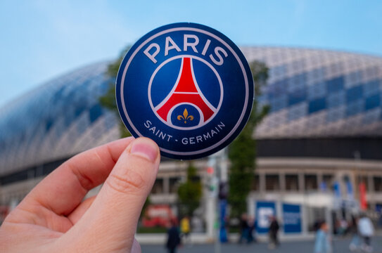 August 30, 2021, Paris, France. The emblem of the football club Paris Saint-Germain F.C. against the backdrop of a modern stadium.