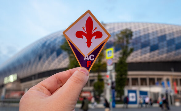 September 12, 2021, Florence, Italy. The emblem of the football club ACF Fiorentina against the background of the modern stadium.