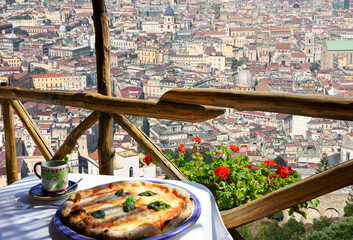 Pizza place terrace with Naples view, Italy