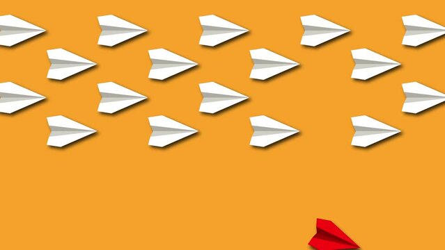 Think differently concept. Red paper plane changes direction. Yellow background.