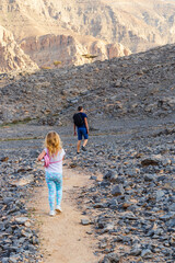 Kids hiking in the mountains. Outdoors