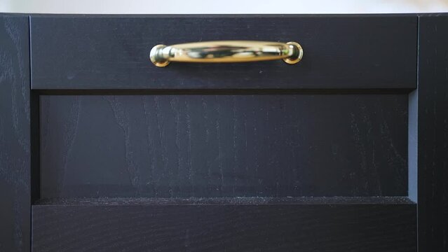 Open and close retro kitchen black drawer with gold handle 4K