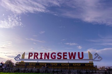 Landmark Pringsewu in the middle of rice fields. Welcome monument to Pringsewu Regency