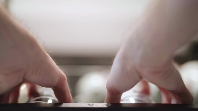 Opening retro kitchen cabinet doors and take out cups extreme low angle view 4K