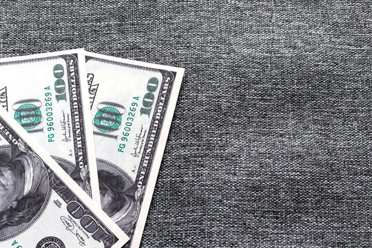 Payment of wages to workers in American bills and copy space. Tax increase and payment of debts.