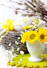 easter decoration with yellow chrysanthemums