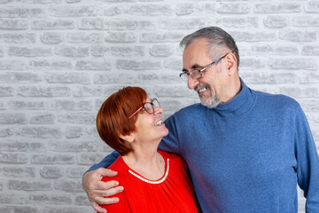 Happy senior old couple bonding embracing relaxing 