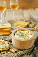 Blue cheese spread with walnuts in a bowl