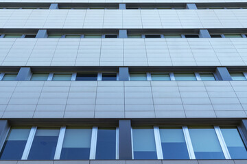 Urban modern building. Close up of an office building facade.