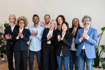 group of business people, different generations, different countries, applause