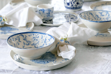 Easter table setting with empty craft ceramic tableware