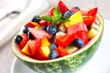 Fresh fruit salad with strawberries, blueberries watermelon and peaches