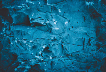 Naklejka premium Lava frozen. Rock pile. Splits in ice. Cool background. Ice cracks. Rock texture. Ice texture. Rough structure mineral. Stone background. Ice surface texture. Abstract texture.