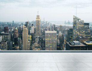 Empty concrete rooftop on the background of a beautiful New York city skyline at sunset, mockup