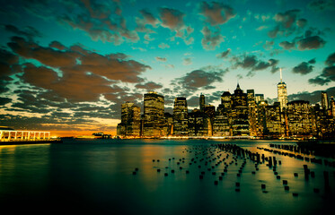 Toned cinematic view of Lower Manhattan in New York City at sunset