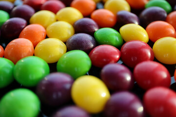 Fototapeta na wymiar colorful round candy close up background wallpaper