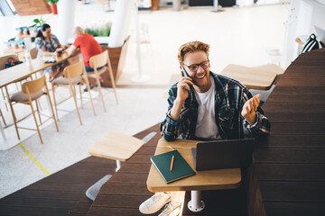 Guy working or studying in coworking office space