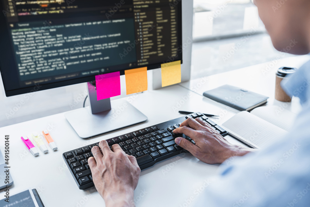 Aufkleber young professional programmer working at developing programming and website working in a software de