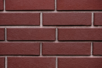 Background from a brick wall with a rough texture. Free space for text and advertising on a uniform background