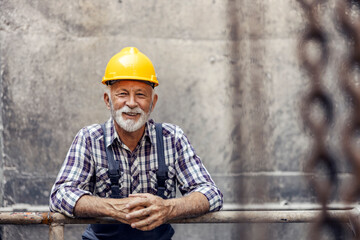 A senior worker in a factory.