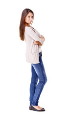 Keeping things casual. Studio show of a beautiful young woman standing with her arms folded against a white background.