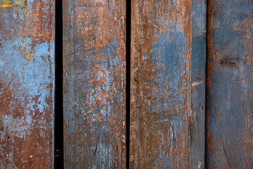 texture of old wooden slats with well-worn paint
