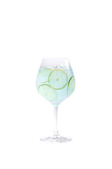 alcoholic drink blue lagoon with lime and ice stands on a white background