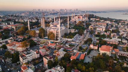 Aerial view of Blue Mosque with six minarets in Istanbul, Turkey. Top view of tourist famous place Sultanahmet Camii  in the old city center on sunset