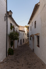 Street in the old town of Grazalema white village in the Natural Park of Grazalema mountain range in the light of day, Cadiz, Andalusia, Spain