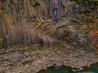 Beautiful aerial view of the studlagil canyon, and the largest number of basalt rock columns in Iceland
