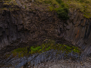Beautiful aerial view of the studlagil canyon, and the largest number of basalt rock columns in Iceland