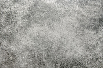 Rustic scratched stone texture. Dark vintage background