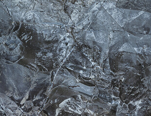 Dark marble. Silver Wall. Rock background. Rock texture. Black texture. Stone background. Rock pile. Paint spots. Rock surface with cracks. Grunge Rough structure. Abstract texture.
