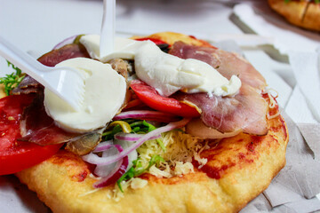 Traditional hungarian food langos. Top view of hungary culinary dish langos