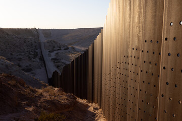 Sunset on the wall that divides the border between Mexico and the United States in Ciudad Juárez...