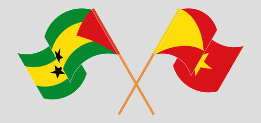 Crossed and waving flags of Sao Tome and Principe and Tigray