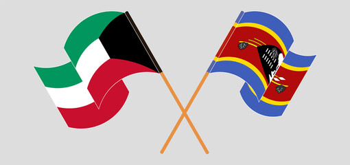 Crossed and waving flags of Kuwait and Eswatini