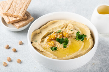 Hummus with carrot. Healthy snack. Vegetarian food. Chickpea hummus.