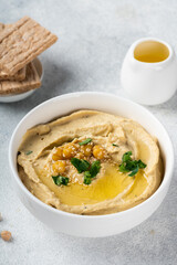 Hummus with carrot. Healthy snack. Vegetarian food. Chickpea hummus.