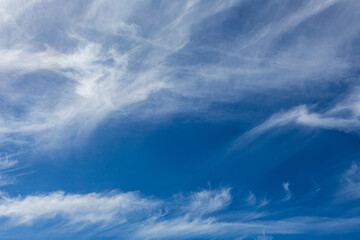 Cirrus and Stratus clouds in dramatic blue sky over Cape Town