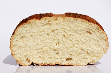 close up of Italian bread loaf, white background 