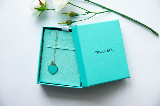 Calgary, Alberta - March  8,, 2022: Tiffany & Co. gift box on white background.