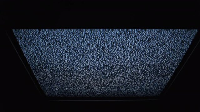 Static TV noise, analog signal. Television screen with static noise, bad signal. Vintage screen. Monochrome, black and white flickering noise. TV effects, artifacts, bad interference. Retro 80s, 90s.