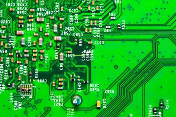 Close up of components and microchips on PC circuit board.