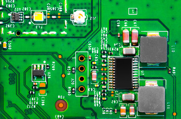 Close up of components and microchips on PC circuit board.