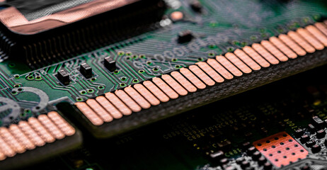 Close up of components and microchips on PC circuit board.