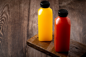 Healthy fruit smoothies in plastic bottles.