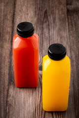 Healthy fruit smoothies in plastic bottles.