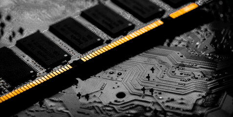 Macro Close up of computer RAM chip and motherboard